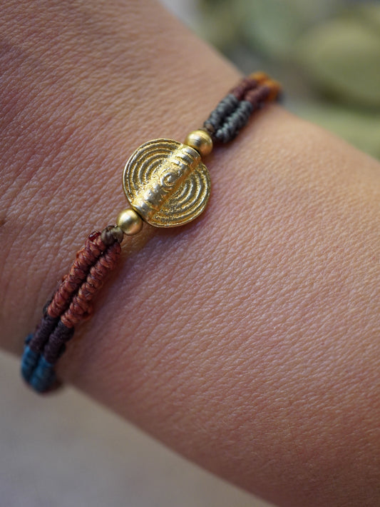 Pulsera Alma Nómada · Símbolo de latón